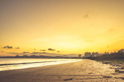 Scenic view of sea at sunset