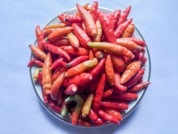 High angle view of red chili peppers on table