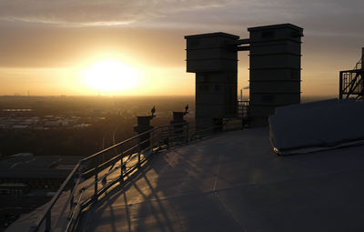 High angle view of city at sunset