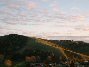 Scenic view of landscape against sky during sunset