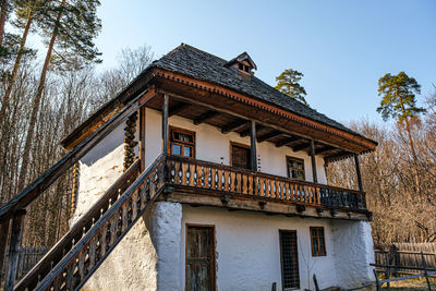 Typical romanian village with old peasant wooden houses