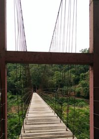 Footbridge against bridge
