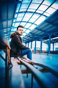 Full length of man sitting in bus