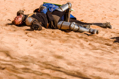 Man sleeping on sand