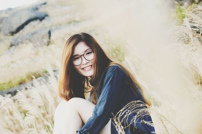 Portrait of smiling young woman