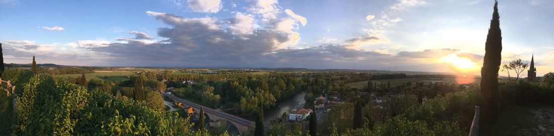 Panoramic view of landscape against sky during sunset