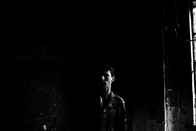 Portrait of young man looking away
