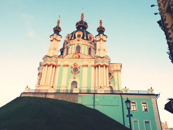 Low angle view of bell tower against sky