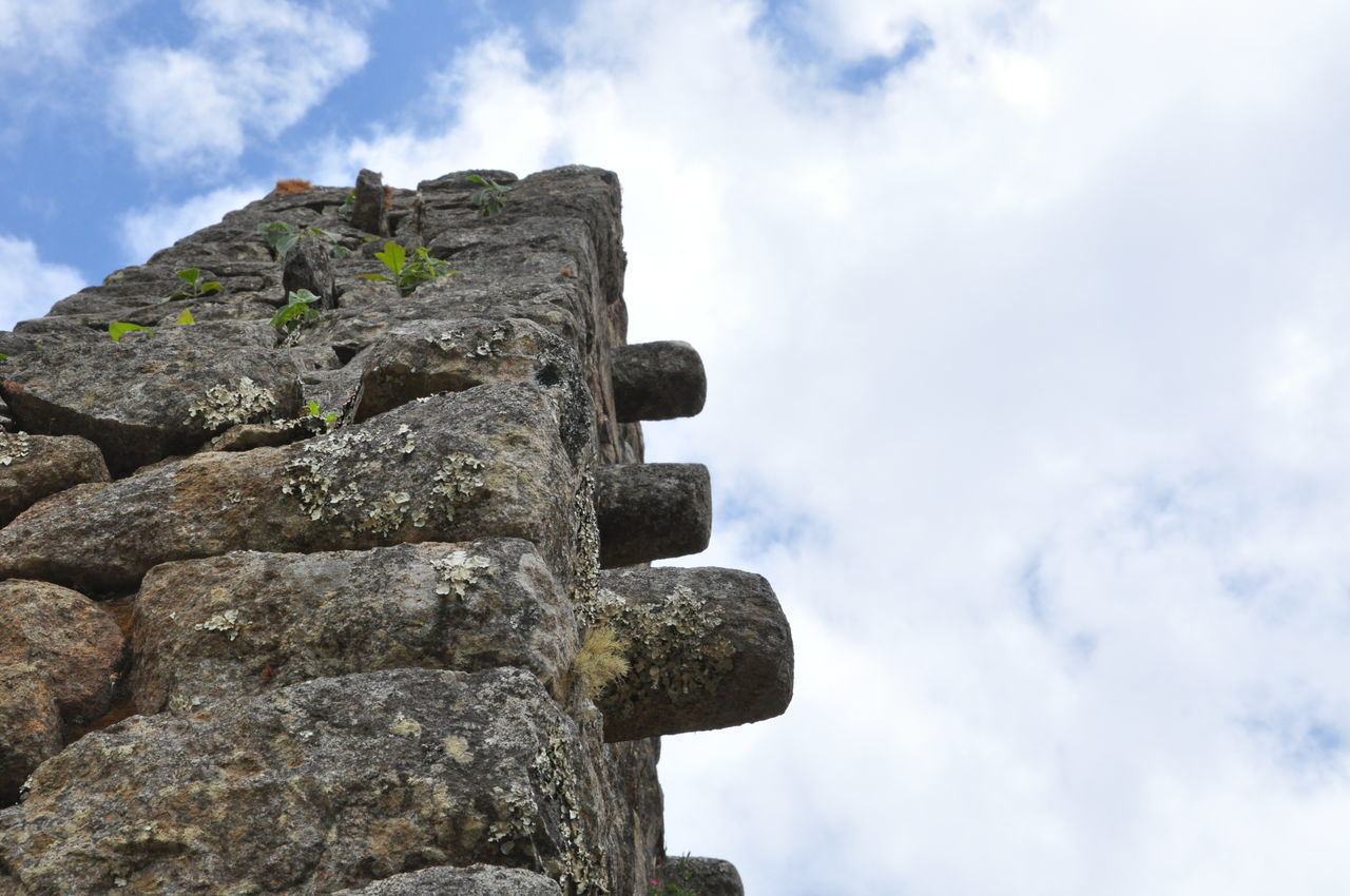 LOW ANGLE VIEW OF STONE STACK AGAINST SKY