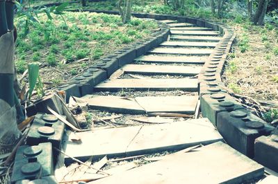 High angle view of abandoned metal structure on field