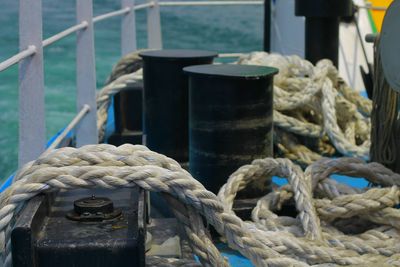 Close-up of rope tied on metal