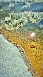 High angle view of sea shore at beach