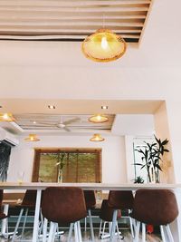 Illuminated chandelier in restaurant