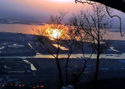 Scenic view of sunset over river
