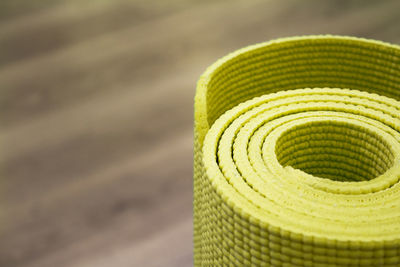 Close-up of rolled exercise mat