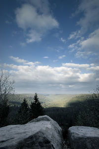 Scenic view of landscape against sky during winter