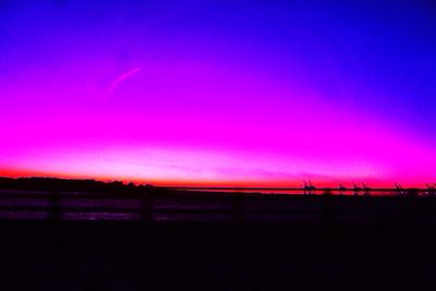 Silhouette of landscape against dramatic sky