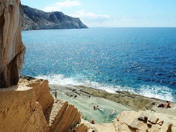 Scenic view of sea against blue sky