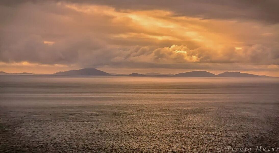 SUNSET OVER MOUNTAINS