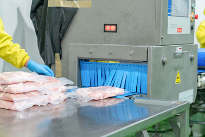 Midsection of man preparing food