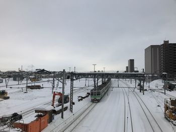 High angle view of train in winter against sky