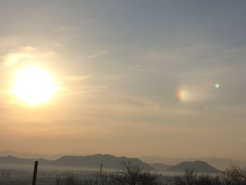 Scenic view of mountains against sky during sunset