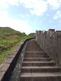 Low angle view of staircase against sky