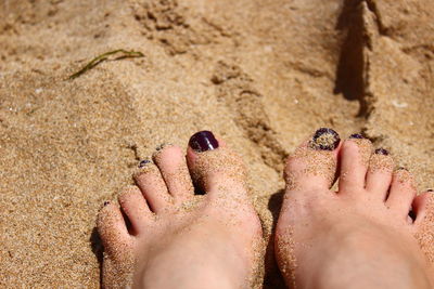 Low section of woman on beach