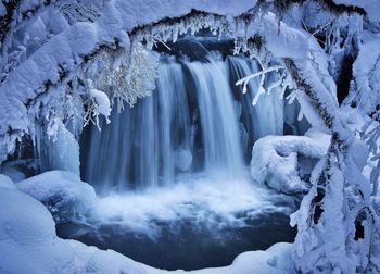 View of frozen waterfall