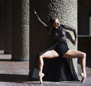 Ballet dancer dancing in city
