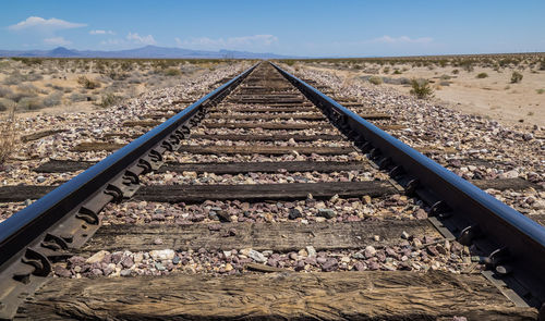 Railroad tracks against sky