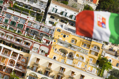 Flag against buildings