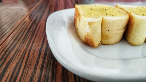 High angle view of bread in plate on table