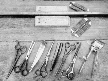 Close-up of barber equipment on table