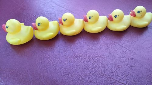 High angle view of rubber ducks on table