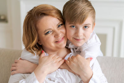 Portrait of smiling young woman at home