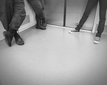 Low section of woman standing on floor