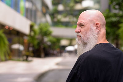 Portrait of man looking at camera