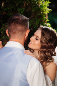 Rear view of couple kissing