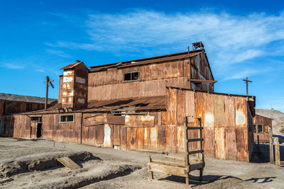 Old building against cloudy sky