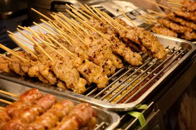 Close-up of meat on barbecue grill