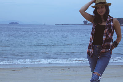 Hipster woman on the beach