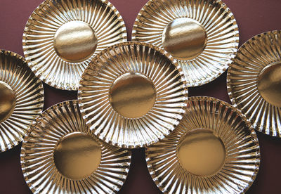 Full frame shot of silver patterned bowls on table