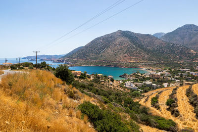 Scenic view of bay against clear sky