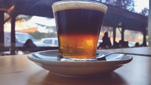 Close-up of beer in glass on table