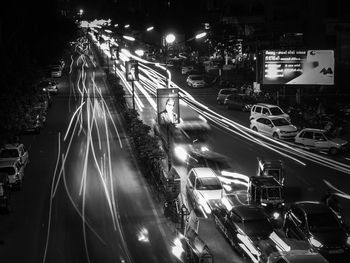 High angle view of light trails on city street at night