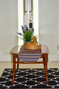 Potted plant on table at home