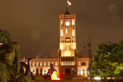 Statue of clock tower at night