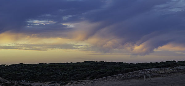 Scenic view of dramatic sky during sunset