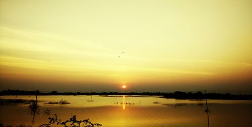 Scenic view of sunset over sea